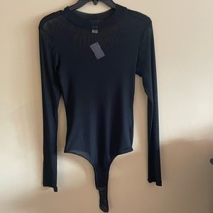 Black mesh long sleeve top. Size Medium.